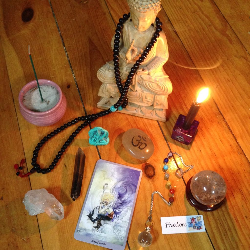 buddha, tarot, crystals